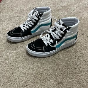 Black white and teal high top vans